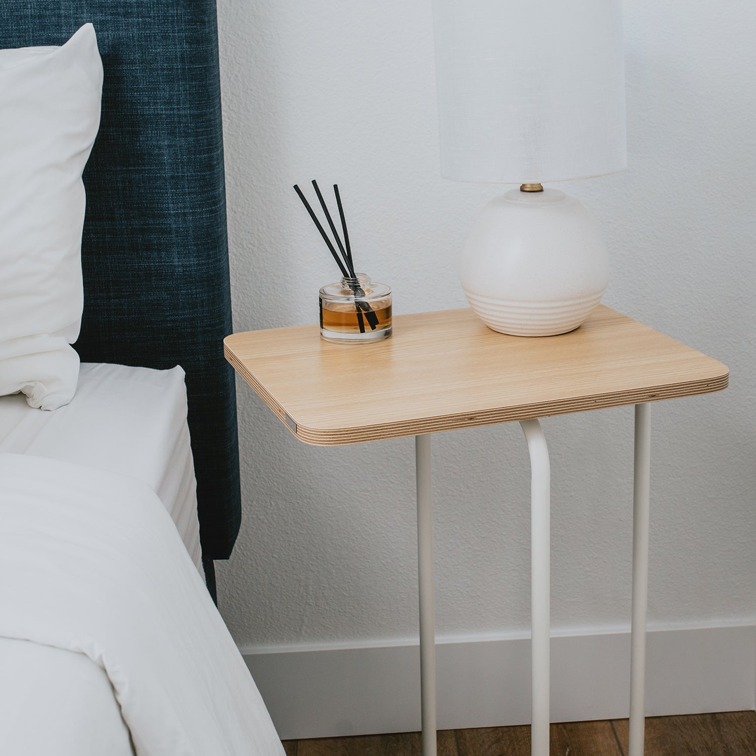 SOFSYS minimalist modern side table or end table that slide under sofa, couch, and bed. simple oak top and L-shaped white metal frame